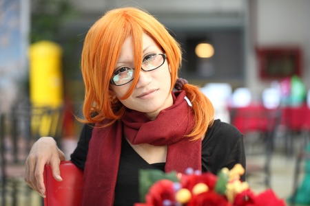 CHIANGMAI, THAILAND - NOV 27: Cosplay festival in Chiangmai.Girl with christmas tree On December ,2011 in Chiangmai, Thailand.のeditorial素材