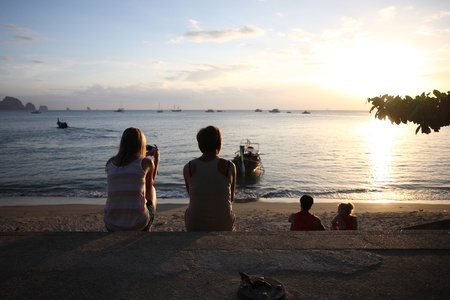 people on beach in sunsetのeditorial素材
