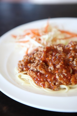 spaghetti with pork in tomato sauceの写真素材