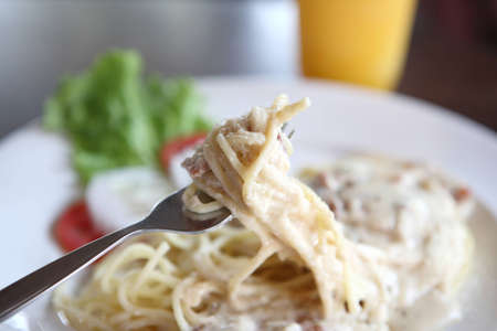 Spaghetti Carbonara with bacon and cheeseの写真素材