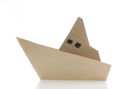 origami boat in white backgroundの写真素材