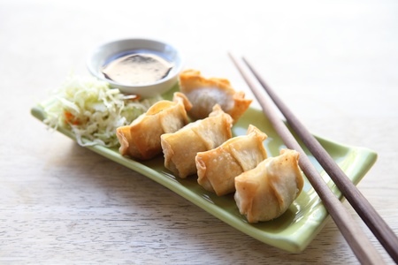 wonton on wood blackgroundの写真素材