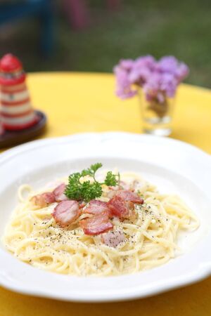 Spaghetti Carbonara with bacon and cheeseの写真素材