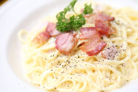 Spaghetti Carbonara with bacon and cheeseの写真素材