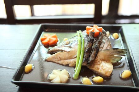 Japanese food boiled head fish with sauce の写真素材