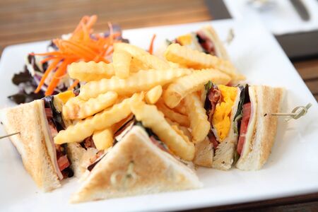 Club sandwich with on wood backgroundの写真素材