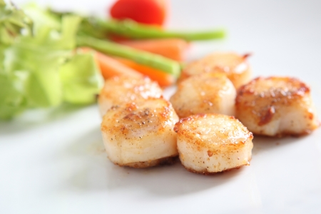 close up of pan seared sea scallopsの写真素材