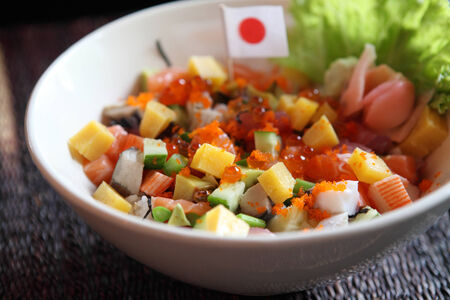 Sushi don , raw salmon tuna octopus on riceの写真素材