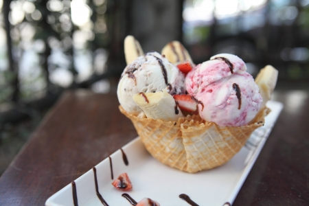 Waffles with ice cream and fruits の写真素材