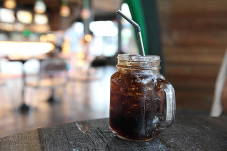 Cola on table