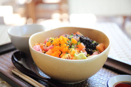 Sushi don , raw salmon tuna octopus on riceの写真素材