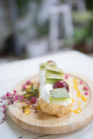 Choux cream with fruitの写真素材