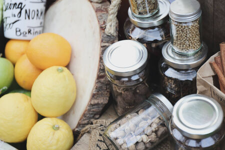 spices in bottles on wooden backgroundの写真素材