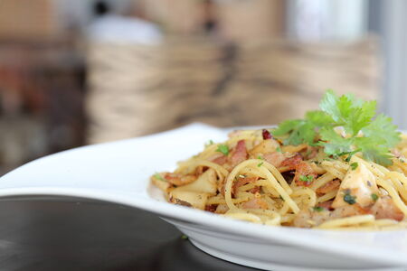 Spaghetti with dried chilli and baconの写真素材