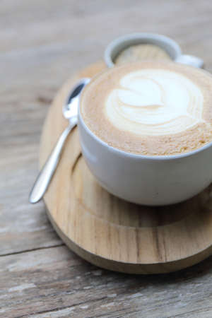 coffee on wood backgroundの写真素材