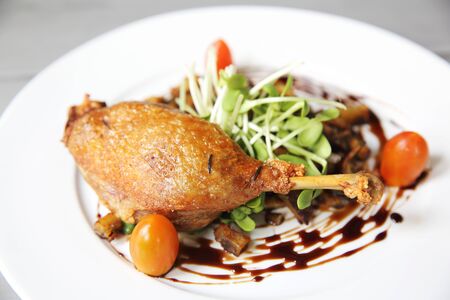 Duck confit , Roasted duck with blueberry sauce