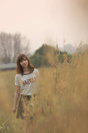 Young woman in wheatの写真素材
