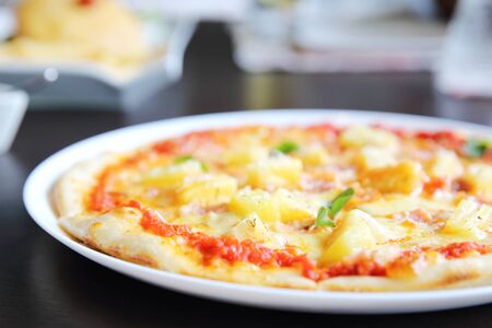 baked pizza hawaiiの写真素材