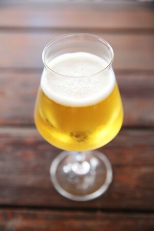 beer on wood backgroundの写真素材