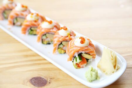 Japanese food Salmon roll on wood background