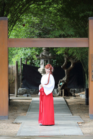 Asian girl portrait, Japanese Miko in natureの写真素材