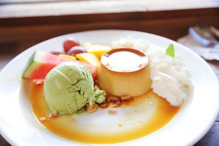 pudding with fruits and ice creamの写真素材