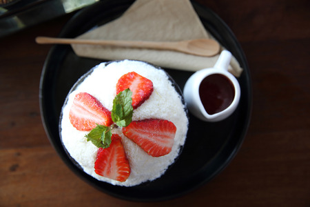 Shaved ice with milk and strawberryの写真素材
