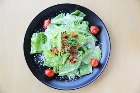 ceacar salad on wood backgroundの写真素材