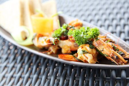 sizzling chilli shrimps with breadの写真素材