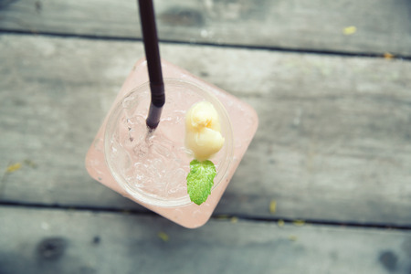 Lychee Juice on wood backgroundの写真素材