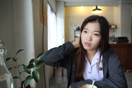 Asian student portrait in outdoorの写真素材