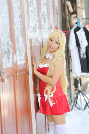 Portrait girl on christmas coat in cityの写真素材