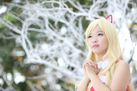 Portrait girl on christmas coat in cityの写真素材