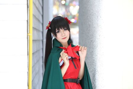 Portrait girl on christmas coat in city