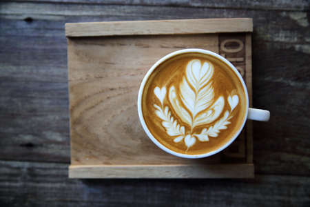 coffee on wood backgroundの写真素材