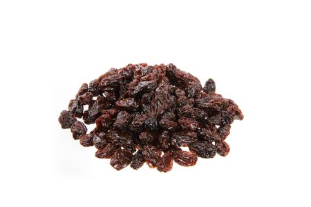 Dried raisins on a white backgroundの写真素材