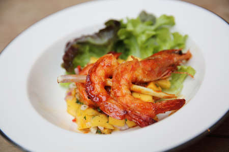 grilled prawns with mango sauceの写真素材