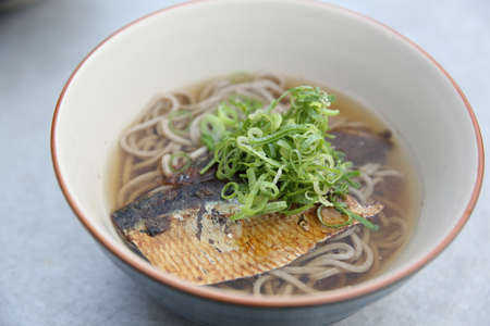 hot soba noodle with mackerel fish , japanese noodle food