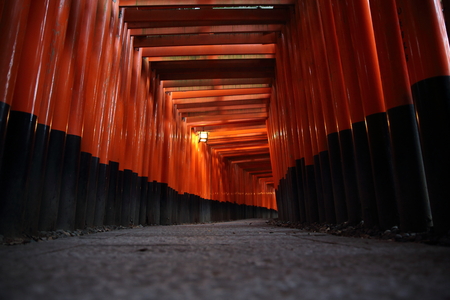 Red Tori Gate at Fushimi Inari Shrine in Kyoto, Japan , selective focus with soft focusのeditorial素材