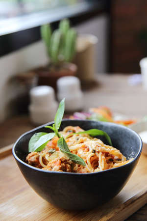 spaghetti and meatballs on wood background italian foodの写真素材