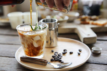 Coffee and orange mix on wood backgroundの写真素材