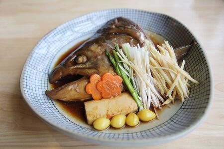 Fish head cooked soy sauce Japanese foodの写真素材