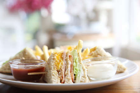 Club sandwich with on wood backgroundの写真素材
