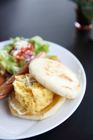 scrambled egg with sausageの写真素材