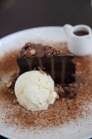 Dark chocolate cake with vanilla ice cream dessert