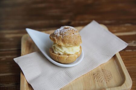 Cream puff choux cream in close upの写真素材