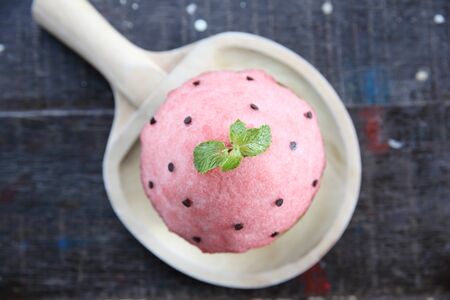 Shaved ice on wood backgroundの写真素材