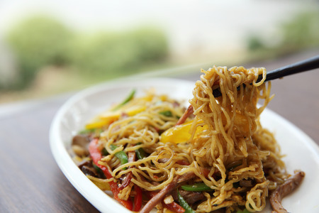 Chinese food fried noodle with hamの写真素材