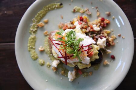 eggs benedict with asparagus sauceの写真素材