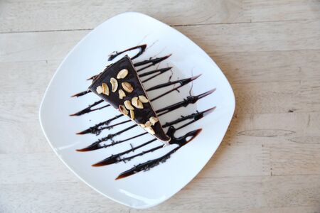 chocolate cake on wood background